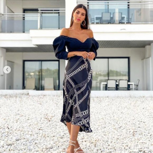 asymmetric chain-print midi dress hindfinesse wearing: @cosstores ASYMMETRIC CHAIN-PRINT MIDI DRESS (195 ~ 2 098 MAD) @bottegavenetaworld Andiamo Clutch (2 800 ~ 30 134 MAD) . . . . . . . We don't sell anything #